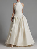 Halter Neck Fit-and-Flare Maxi Dress With Structured Pleated Skirt
