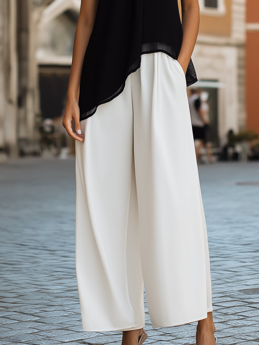 Elegant Two-Tone High-Neck Halter Set – Asymmetric Chiffon Top & Wide-Leg Trousers